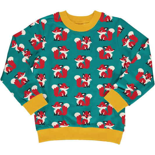 Vaikiškas džemperis iš GOTS sertifikuotos organinės medvilnės. Ryškių, kontrastingų spalvų, margintas žaismingu lapyčių raštu. 